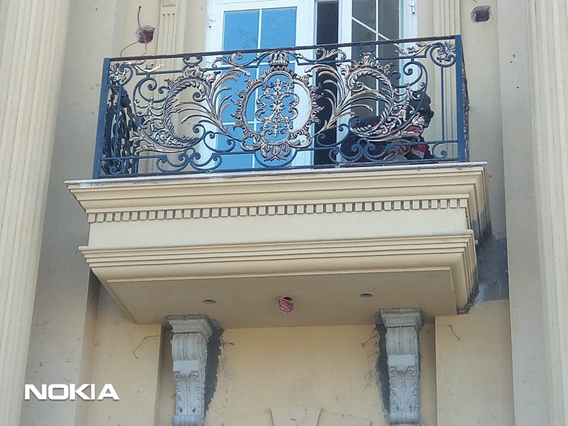Elegant Black Balcony with Gold Detail